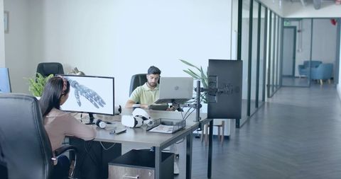 Innovative Collaboration on Robotic Hand Prototype in Tech Office