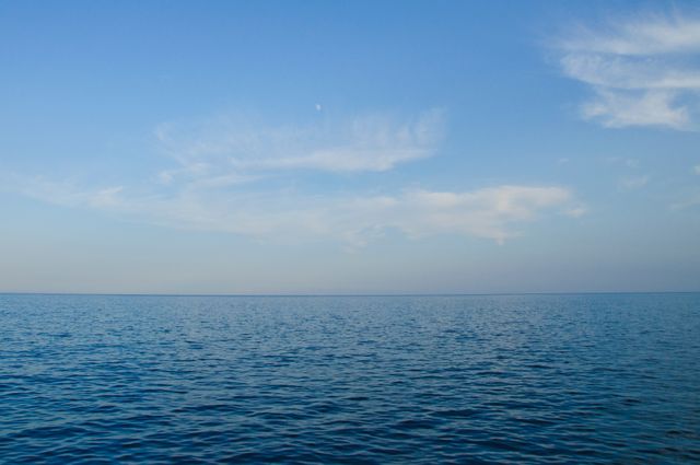 Calm Blue Ocean with Clear Sky Horizon - Download Free Stock Photos Pikwizard.com