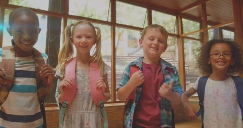 Diverse Happy Children in Classroom Smiling