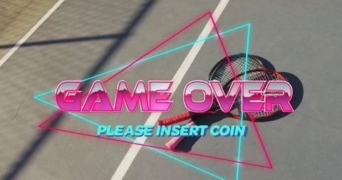Neon game over graphic on shadowed tennis court