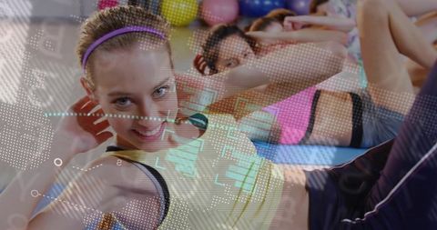 Energetic Group Fitness Class with Contemporary Digital Overlay