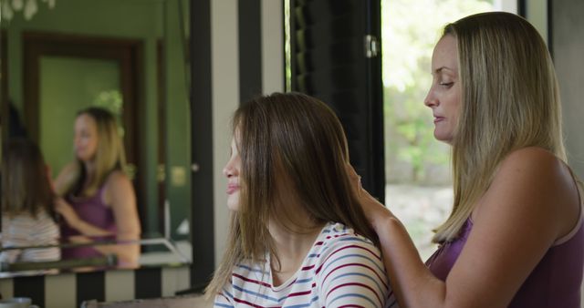 Mother Braiding Daughter's Hair in Cozy Home Environment - Download Free Stock Images Pikwizard.com