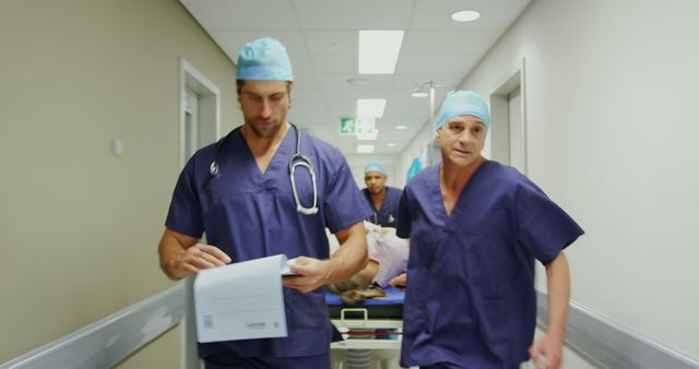 Emergency Medical Team Rushing Through Hospital Corridor - Download Free Stock Images Pikwizard.com