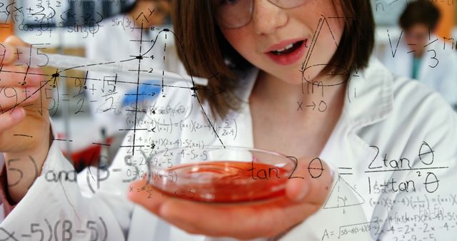 Young Scientist Conducting Laboratory Experiment with Mathematical Equations - Download Free Stock Images Pikwizard.com