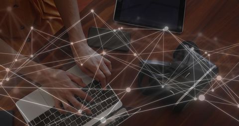 Caucasian Businesswoman Utilizing Digital Network on Laptop