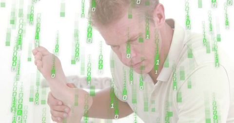 Therapist examining patient's foot with green binary overlay for digital healthcare