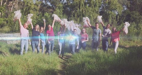 Diverse Volunteer Group Celebrating Eco Cleanup Success - Download Free Stock Images Pikwizard.com