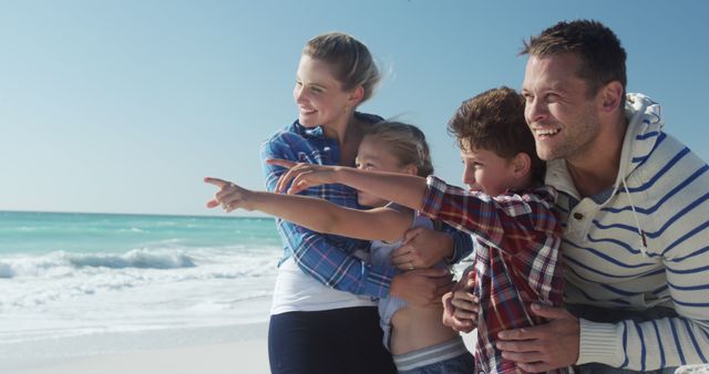 Happy Family Enjoying Vacation at Beach - Download Free Stock Images Pikwizard.com