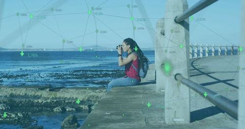 Network Connections Around Photographer by Ocean