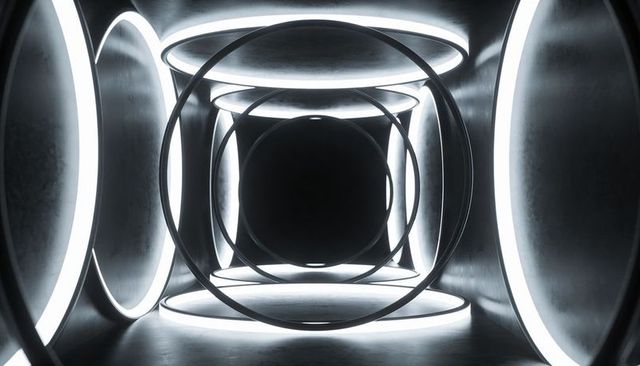 Futuristic monochrome tunnel with concentric led rings and symmetrical metallic corridor