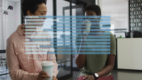 Diverse Female Professionals Discuss Ideas with Digital Graph Overlay