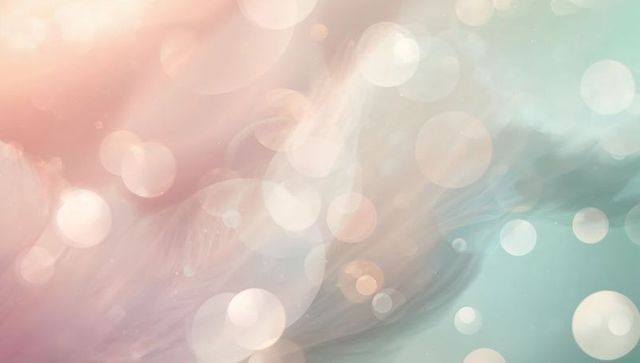 Dreamy pastel bokeh swirl with soft gradient, wispy textures and ethereal glow