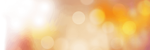 Abstract bokeh with warm yellow transparent light circles