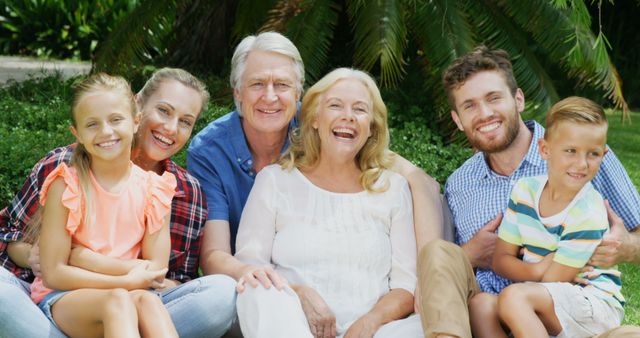 Happy Multi-Generational Family Smiling Outdoors in Tropical Garden - Download Free Stock Images Pikwizard.com