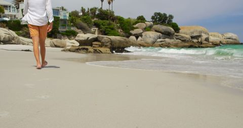 Barefoot Man Walking on Sunny Beach - Download Free Stock Images Pikwizard.com