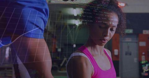 Woman lifting weights while tracking fitness data overlay in gym partner workout