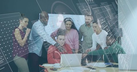 Diverse Team Collaborating Around Laptop with Futuristic Data Overlay in Boardroom
