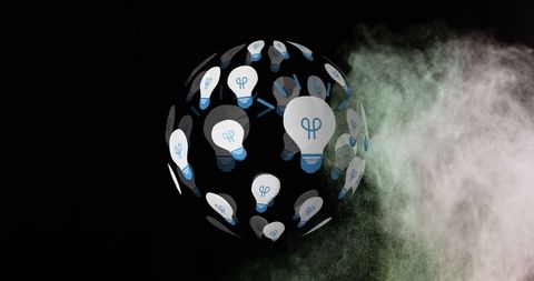 Floating lightbulbs sphere in mist and darkness