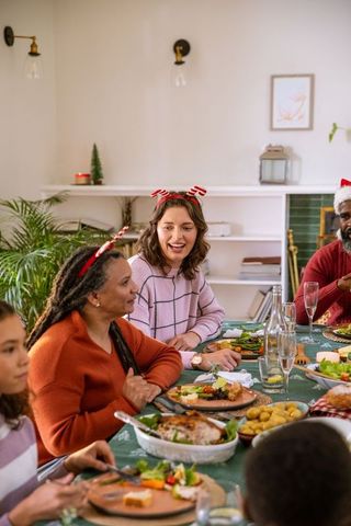 Diverse Family Celebrating Holiday with Festive Dinner