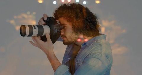 Creative photographer with dslr camera and artistic lens reflection