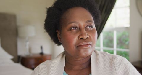Pensive Senior Woman at Home during Quarantine