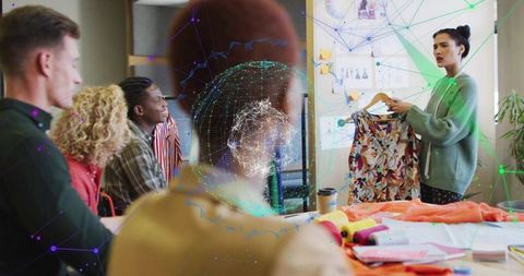 Innovative Fashion Designer Presenting in Collaborative Meeting Room