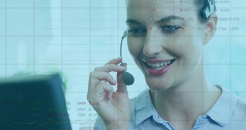 Smiling businesswoman with headset engaged in virtual communication