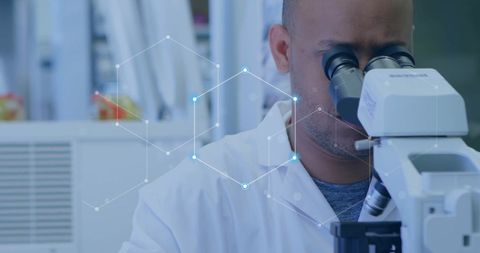Scientist Analyzing Data Through Microscope in Lab Setting - Download Free Stock Images Pikwizard.com