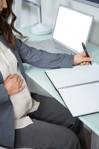 transparent pregnant businesswoman in home office writing in notebook - Download Free Stock Videos Pikwizard.com