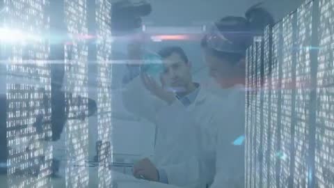 Scientists Analyzing Blue Liquid in High-Tech Laboratory