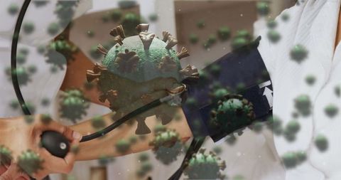 Healthcare worker checks senior's blood pressure amid pandemic