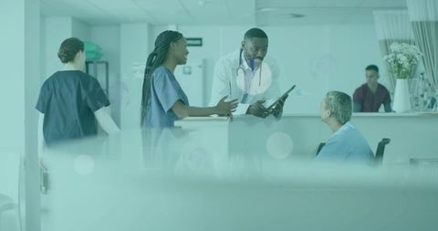Doctors Collaborating with Patient at Hospital Reception