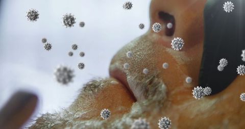 Close-Up of Barber Shaving Client with Protective Measures during Pandemic