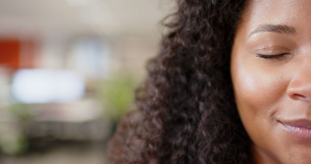 Close-up of Woman Relaxing with Eyes Closed in Office - Download Free Stock Images Pikwizard.com