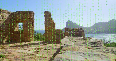 Ancient ruins overlook coast with binary overlay