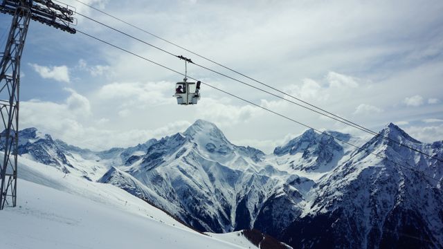 Ski Lift in Snowy Mountain Range with Blue Sky - Download Free Stock Images Pikwizard.com