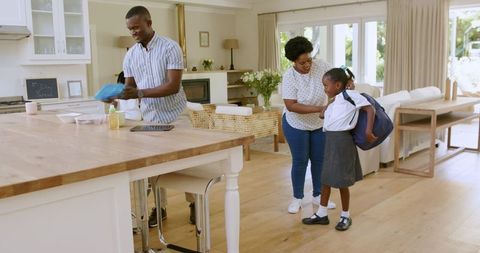 Family Bonding on School Morning in Cozy Home Setting