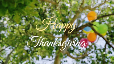 Happy Thanksgiving Text with Balloons in Tree Background