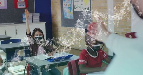 Masked students in tech-savvy classroom learning environment