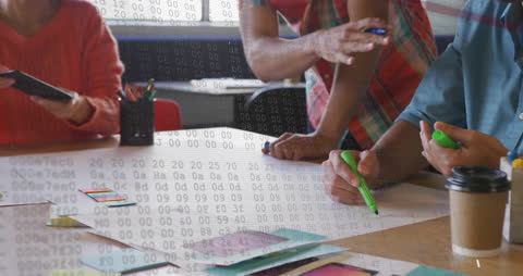 Engineers Collaborating Over Architectural Blueprints and Data