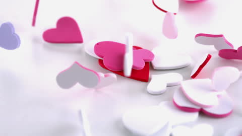 Colorful Heart Confetti Falling in Slow Motion