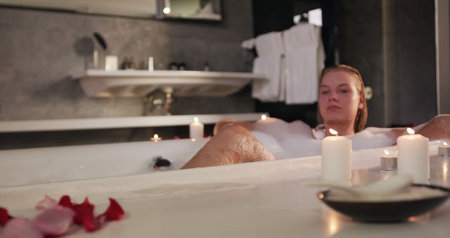 Woman Relaxing in Luxury Bath with Foam and Candles - Download Free Stock Images Pikwizard.com