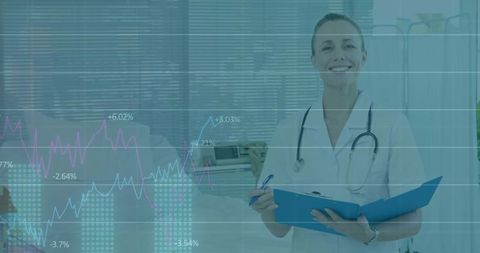 Smiling doctor with clipboard planning healthcare strategies