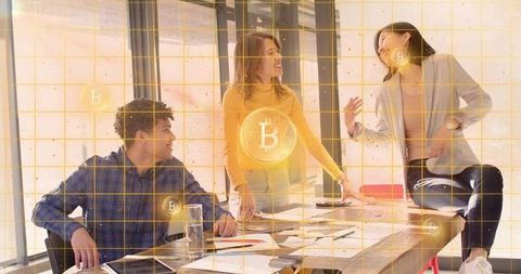 Team discussing bitcoin strategy in modern office during collaborative brainstorm