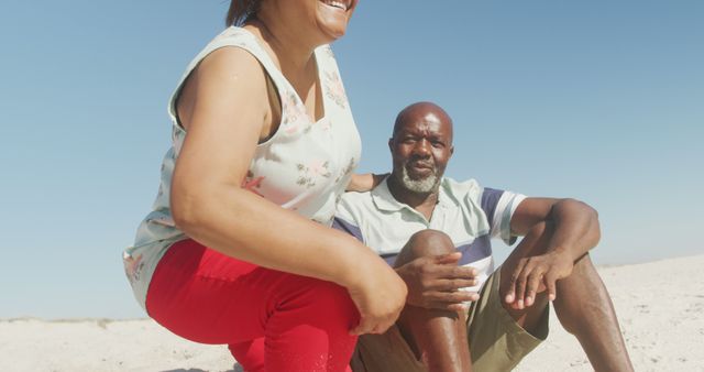 Smiling Couple Enjoying Relaxing Day at Beach - Download Free Stock Images Pikwizard.com