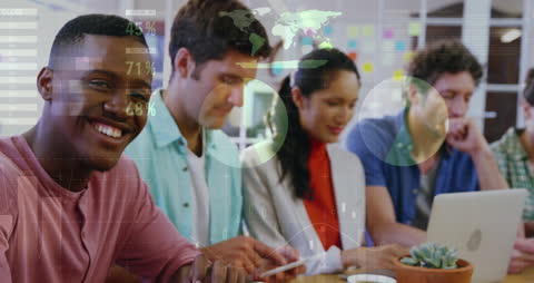 Diverse Business Team Collaborating with Digital Technology in Office