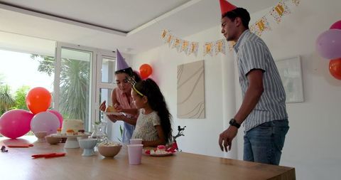 Family Birthday Celebration with Cake and Decorations