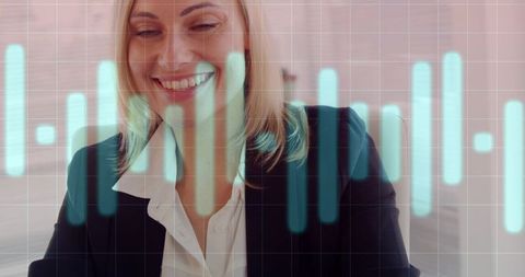 Businesswoman smiling while analyzing data with futuristic turquoise bar overlay