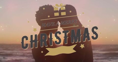 Romantic Couple Enjoying Sunset Christmas at Beach