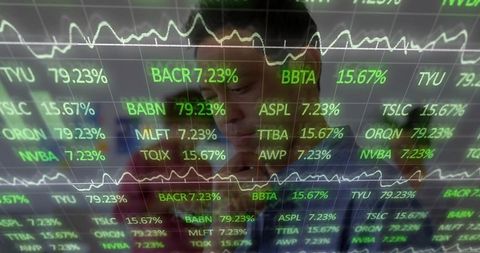 Business Professional Analyzing Financial Data on Digital Display